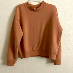 Women’s top sweater, and juggles